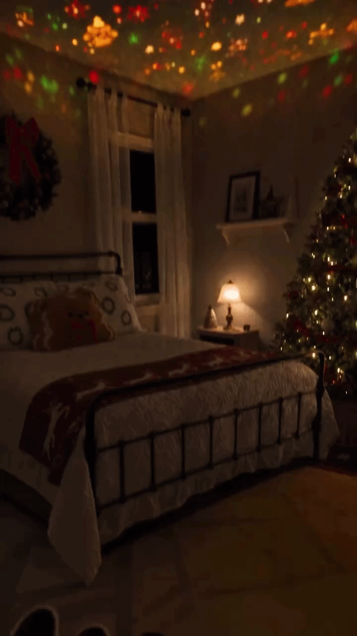 A cosy bedroom lit by a warm festive glow